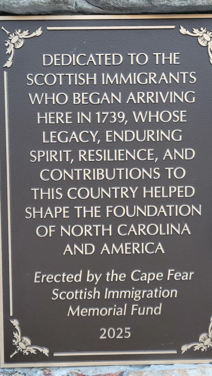 Memorial cairn dedication plaque